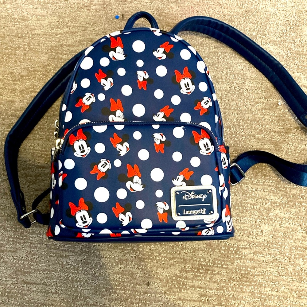 Disney lounge-fly backpack never used tag still on it.